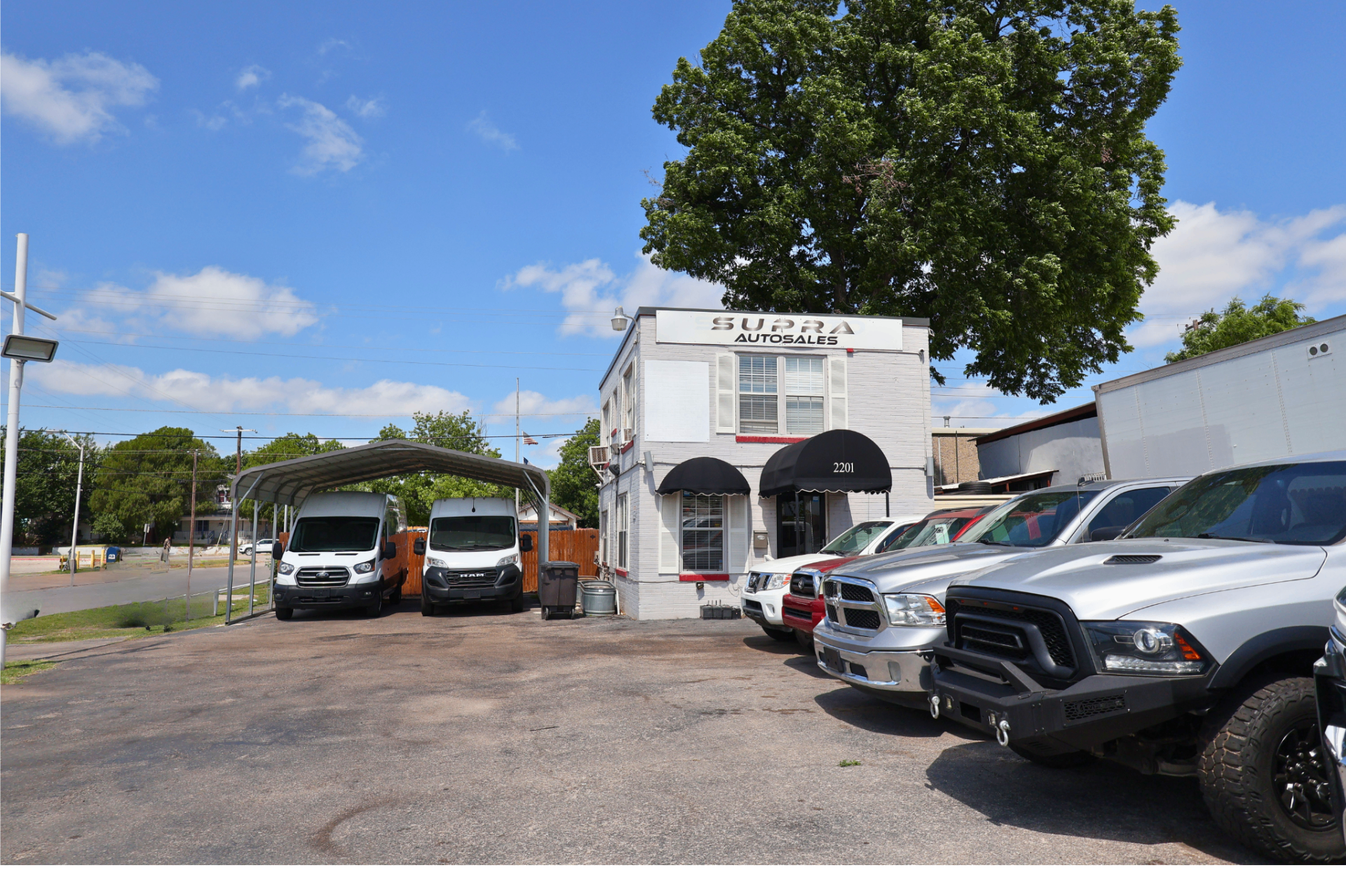 Supra Auto Sales dealership lot in Fort Worth, TX